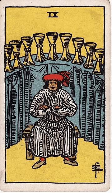 Nine of Cups tarot card